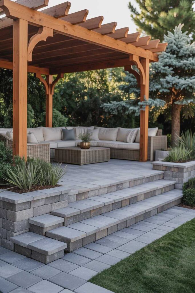 30+ Stunning Paver Patio Ideas for a Modern, Budget-Friendly Outdoor Makeover 5 Use Pavers for a Raised Patio Design